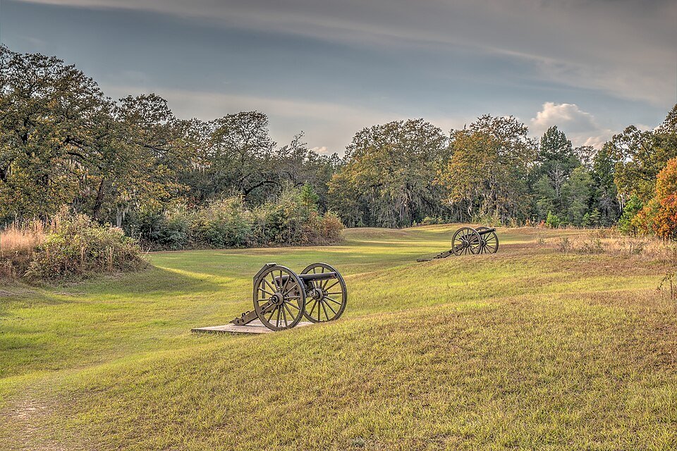 Two Civil War-era cannons on a grassy rise