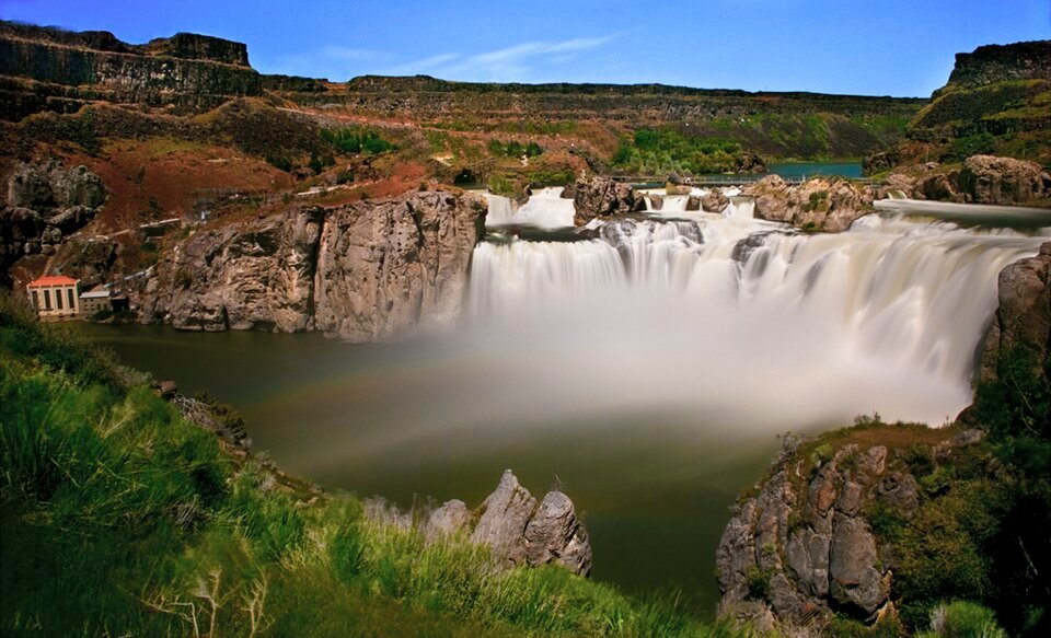 Long-exposure view of Shoshone Falls, with the water blurred into a smooth veil in front of the canyon walls
