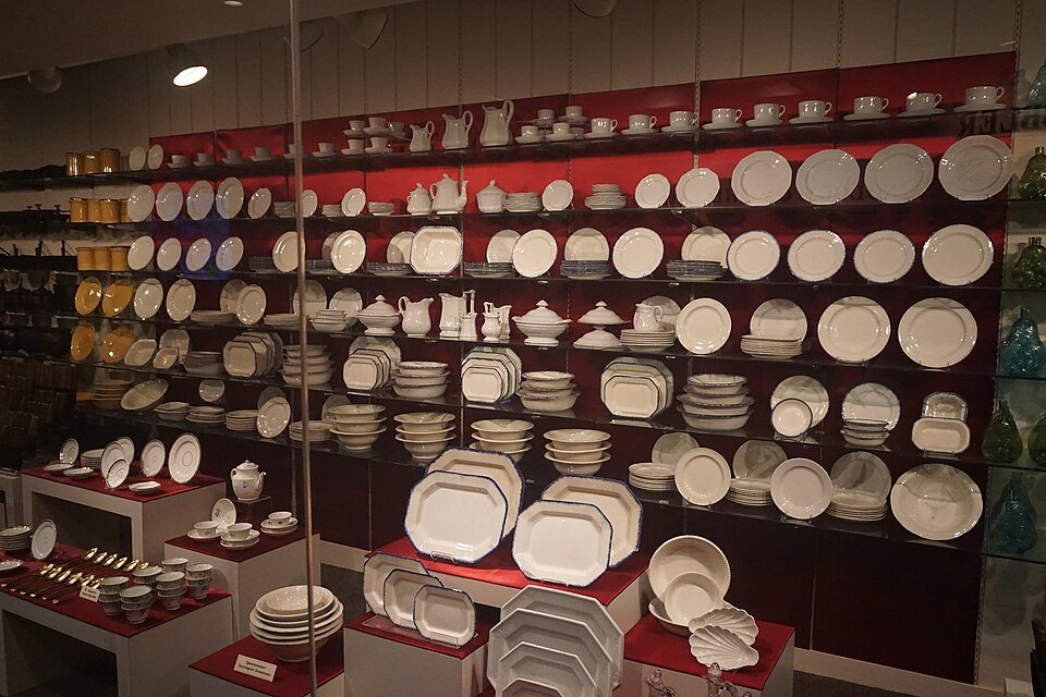 Shelves of china plates, cups and serving dishes from the Arabia’s cargo on display at the museum