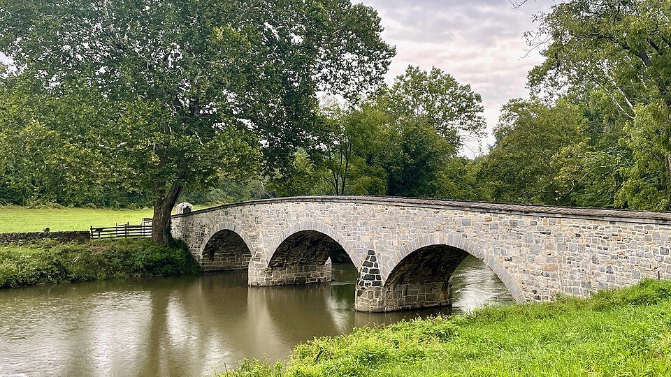 Burnside's Bridge, a stone-arch bridge over Antietam Creek at Sharpsburg, Maryland, surrounded by trees
