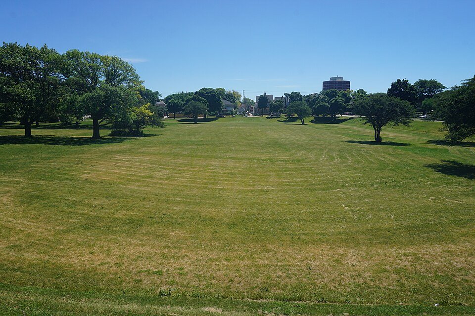 The open lawn where formal sunken gardens once stood, south of the conservatory