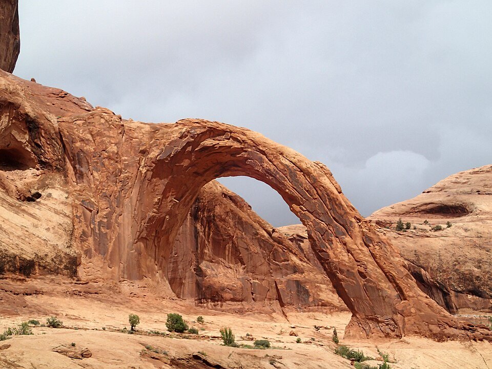 Corona Arch under a cloudy sky west of Moab, Utah