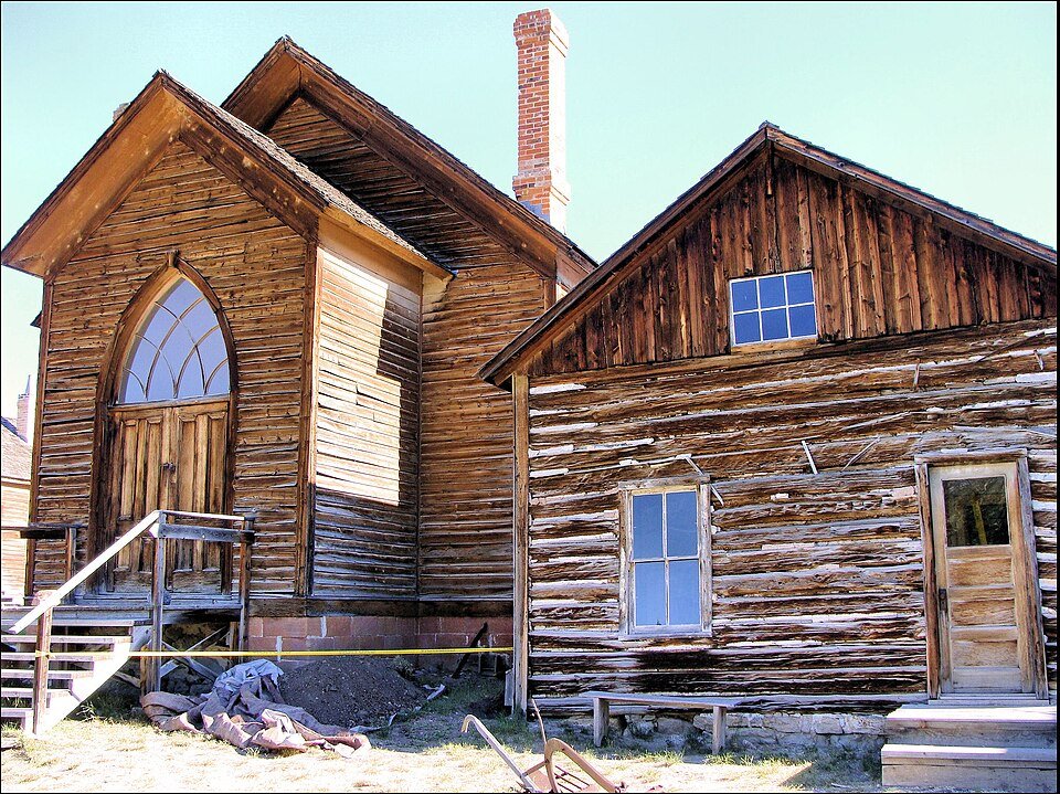 The Methodist church, with an adjoining log building, in Bannack, Montana