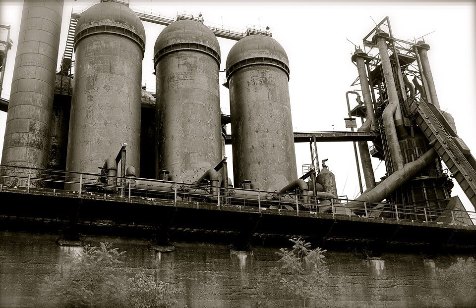 Hot blast stoves and a blast furnace at Carrie Furnaces, in black and white