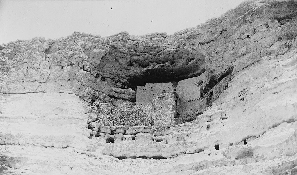 Historic black-and-white photograph of the dwelling in the cliff, taken by Edgar A. Mearns