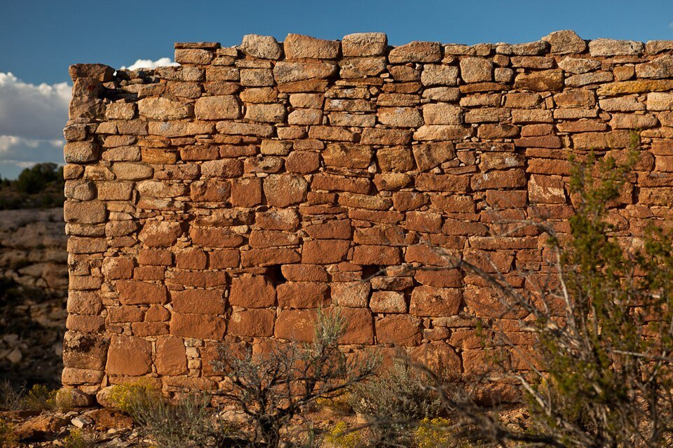Close view of the layered stone masonry of Rim Rock House at Hovenweep